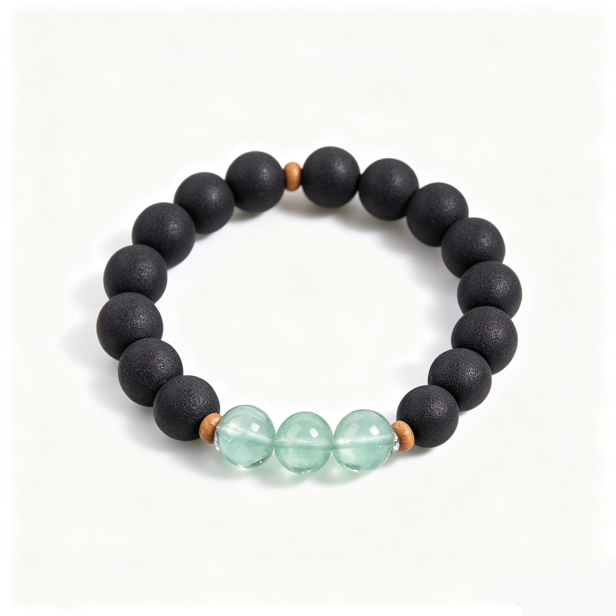 BEYUL Pearl Essence black incense bead bracelet with fluorite accents — handmade pressed botanical beads, front view