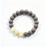 BEYUL Wood Element incense bead bracelet with jade beads — handmade pressed botanical beads, front view