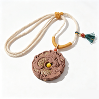 BEYUL Dragon Medallion aroma amulet pendant with cord and tassel — pressed botanical amulet on braided cord, alternate view 3