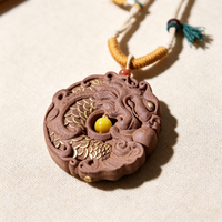 BEYUL Dragon Medallion aroma amulet pendant with cord and tassel — pressed botanical amulet on braided cord, alternate view 4
