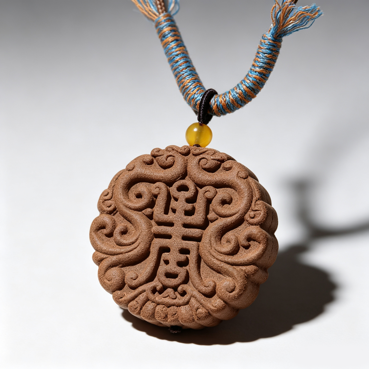 BEYUL Auspicious Longevity aroma amulet pendant with cord and tassel — pressed botanical amulet on braided cord, alternate view 5