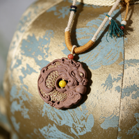 BEYUL Dragon Medallion aroma amulet pendant with cord and tassel — pressed botanical amulet on braided cord, alternate view 5