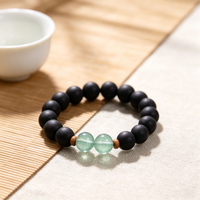 BEYUL Pearl Essence black incense bead bracelet with fluorite accents — hand-strung elastic bracelet, alternate view 6